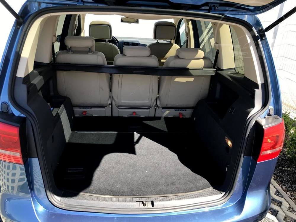 Metallic Blue Volkswagen Touran 2015, rear view of the car body, open boot space is really spacious