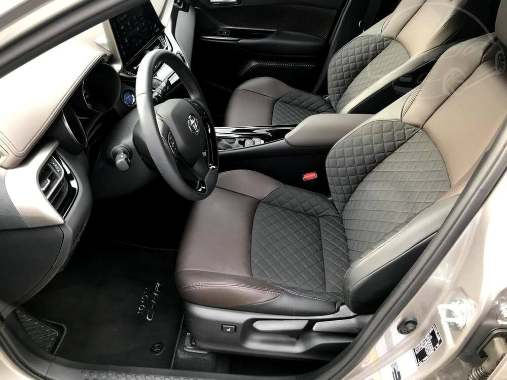 Grey Toyota C-HR, interior, front seats with leather upholstery, dealer Auto Faltys