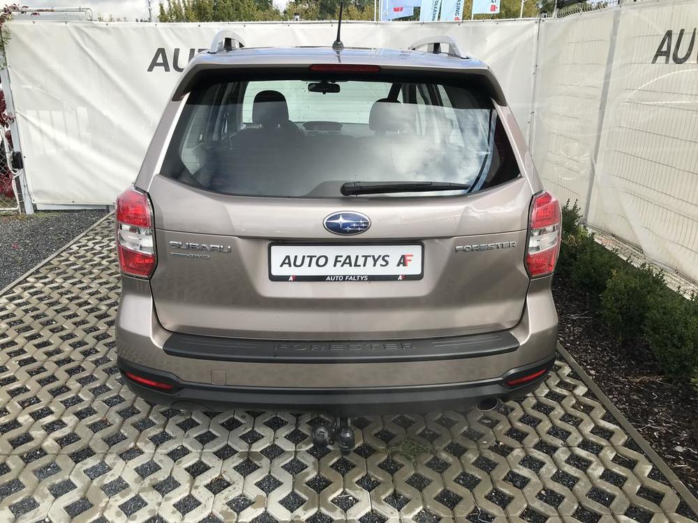 Metallic beige Subaru Forester 2013, rear view of the car body, dealer Auto Faltys