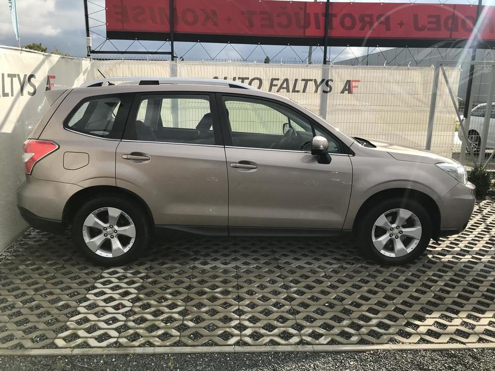 Metallic beige Subaru Forester 2013, right side view of the car body, dealer Auto Faltys